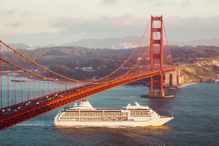 Cruise Ship Sailing Under A Bridge