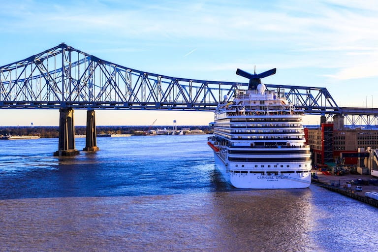 Cruise Ship By A Bridge