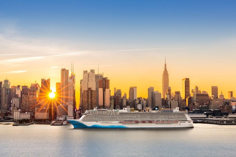 Cruise Ship Sailing With New York City In Background