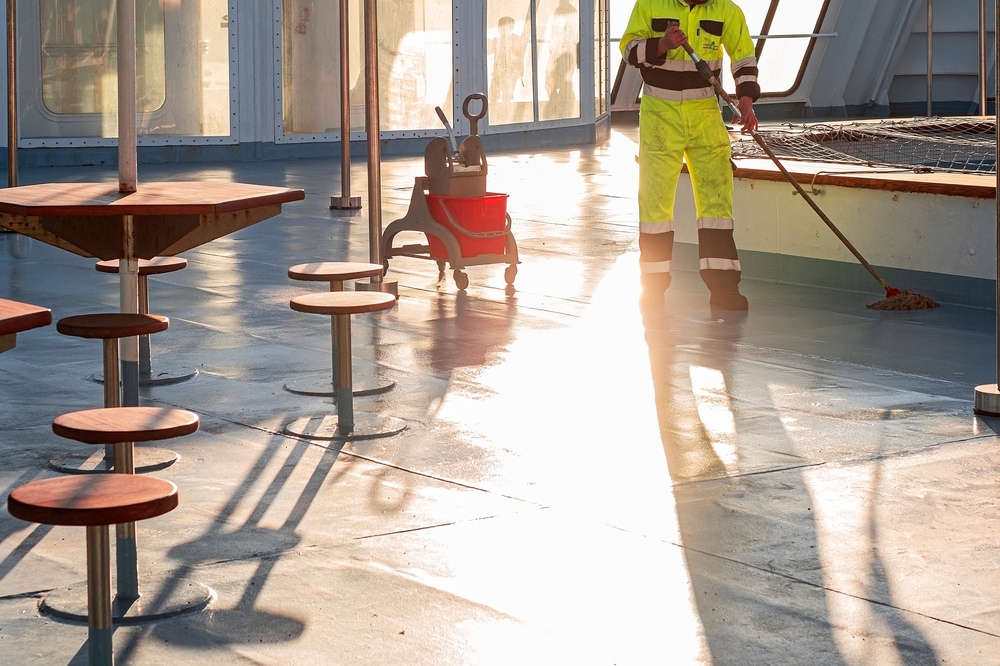 Photo of a Man Cleaning Cruise Ship